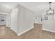 Bright entryway with light grey walls and wood-look flooring at 2538 Gemena Rd, Chapel Hill, NC 27516