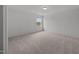 This bedroom features neutral carpet and a window letting in natural light at 2995 Faucette Ln, Burlington, NC 27217
