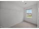 Walk in closet with wire shelving and a window at 2995 Faucette Ln, Burlington, NC 27217