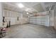 Unfinished garage with roll up door at 2995 Faucette Ln, Burlington, NC 27217