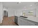 Open concept kitchen with stainless steel appliances and large island at 2995 Faucette Ln, Burlington, NC 27217
