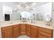 This primary bathroom offers dual sinks and a large mirror at 30155 Pharr, Chapel Hill, NC 27517