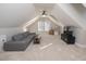 Spacious bonus room with a ceiling fan, carpet flooring, and natural light at 30155 Pharr, Chapel Hill, NC 27517