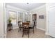 Breakfast nook with bright natural light, views and cozy seating at 30155 Pharr, Chapel Hill, NC 27517