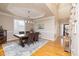 Traditional dining room with hardwood floors, recessed lighting and dark wood table at 30155 Pharr, Chapel Hill, NC 27517