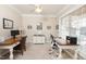 This home office features a large window, a ceiling fan, and natural lighting at 30155 Pharr, Chapel Hill, NC 27517