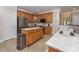 Spacious kitchen with stainless steel appliances, granite countertops and kitchen island at 30155 Pharr, Chapel Hill, NC 27517