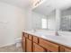 Double vanity bathroom with a large mirror and tiled floor at 3021 Polanski Dr, Wake Forest, NC 27587