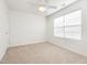 Simple bedroom with ceiling fan and neutral carpeting at 3021 Polanski Dr, Wake Forest, NC 27587