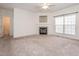 Living room with fireplace, carpet, and access to a bathroom at 3021 Polanski Dr, Wake Forest, NC 27587