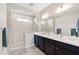 Elegant bathroom with double vanity, large shower, and modern fixtures at 313 Crossland Dr, Chapel Hill, NC 27517