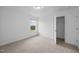 Bedroom features a window with natural light, carpet, and access to a closet at 3615 Nc-62, Burlington, NC 27217