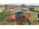 Aerial view of the back exterior features blue siding, a dark roof, and a prepared yard at 3615 Nc-62, Burlington, NC 27217