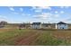 A wide shot of homes under construction, with light siding and unfinished yards at 3649 Nc-62, Burlington, NC 27217
