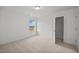 Cozy bedroom with carpet, closet, and a window offering natural light and outdoor views at 3649 Nc-62, Burlington, NC 27217