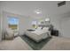 Cozy bedroom with plush carpet, natural light, and neutral decor at 3649 Nc-62, Burlington, NC 27217
