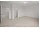 Bedroom with neutral carpet, 2 closets, and white doors with dark hardware at 3649 Nc-62, Burlington, NC 27217