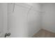 Walk-in closet featuring wire shelving and neutral carpeting at 3649 Nc-62, Burlington, NC 27217