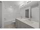 Bathroom features double sinks, large mirror, and shower-tub combo at 3655 Nc-62, Burlington, NC 27217