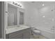 This bathroom features double sinks, large mirror, and shower-tub combo at 3655 Nc-62, Burlington, NC 27217