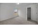 Bedroom featuring neutral carpet, fresh paint, single window, and an open closet at 3655 Nc-62, Burlington, NC 27217