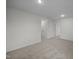 Large bedroom offers plenty of space and natural light with multiple doorways, suitable for comfortable living at 3655 Nc-62, Burlington, NC 27217
