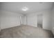 Spacious bedroom features neutral carpet, fresh paint and two open doorways at 3655 Nc-62, Burlington, NC 27217