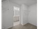 This walk-in closet features wire shelving for optimal organization and ample storage space at 3655 Nc-62, Burlington, NC 27217