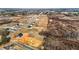 Scenic aerial shot showcases newly built homes in a developing community with picturesque countryside surroundings at 3689 Nc 62, Burlington, NC 27217