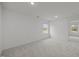Spacious carpeted bedroom with window creating a bright and inviting atmosphere at 3689 Nc 62, Burlington, NC 27217