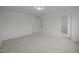 Spacious carpeted bedroom with multiple access points creating an open and inviting space at 3689 Nc 62, Burlington, NC 27217