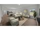 Spacious living room with two couches, an area rug, and hardwood flooring at 3689 Nc 62, Burlington, NC 27217