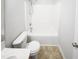 A full bathroom with a shower over tub, toilet and vanity at 3810 Chehaw Dr, Raleigh, NC 27610
