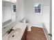 Clean bathroom with a bathtub, toilet, and vanity at 3810 Chehaw Dr, Raleigh, NC 27610