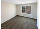 A well lit bedroom with a large window for natural light at 3810 Chehaw Dr, Raleigh, NC 27610