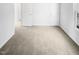 A large bedroom with neutral walls, carpeting and a window at 3810 Chehaw Dr, Raleigh, NC 27610