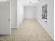 A bright bedroom with neutral walls, carpeting and a window at 3810 Chehaw Dr, Raleigh, NC 27610