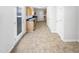 Bright kitchen with access to the yard, tile floors, and ample storage at 3810 Chehaw Dr, Raleigh, NC 27610