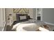 Comfortable bedroom featuring a stylish design and cozy ambiance, perfect for relaxation at 3813 Peaceful Creek Trl, Zebulon, NC 27597