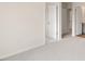 Bedroom with carpet and doors to other rooms at 412 Honeycutt Oaks Dr, Angier, NC 27501