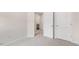 Bedroom with carpet, door to bathroom and closets at 422 Honeycutt Oaks Dr, Angier, NC 27501