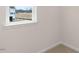 Small bedroom with window and carpet at 422 Honeycutt Oaks Dr, Angier, NC 27501