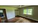 Bedroom with hardwood floors and large window at 4224 Us 401, Louisburg, NC 27549