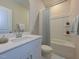 Bathroom with a tub, shower, and single vanity at 483 White Birch Ln, Angier, NC 27501