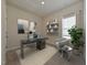 Bright home office features a large desk, comfortable chair, and ample natural light at 483 White Birch Ln, Angier, NC 27501