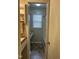 Cozy bathroom featuring a shower/tub combination, window, and vanity at 494 S Mason St, Coats, NC 27521