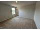 Bedroom with neutral carpet, large windows, and abundant natural light at 50 Cordoba Dr, Franklinton, NC 27525