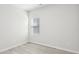 Well-lit bedroom featuring wood-look floors and window at 511 White Birch Ln, Angier, NC 27501