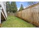Landscaped backyard with wooden fence and stairs to deck at 520 S Bloodworth St, Raleigh, NC 27601