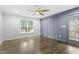 Spacious bedroom with hardwood floors and access to a porch at 520 S Bloodworth St, Raleigh, NC 27601